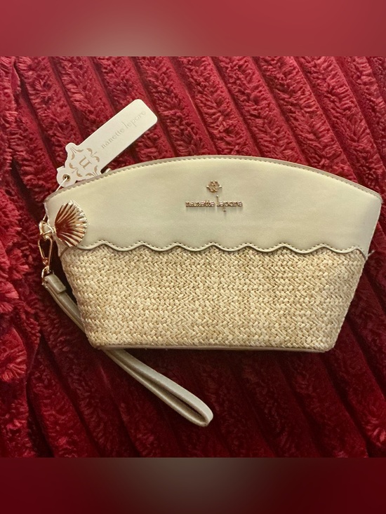 Nanette Lepore Handbags - Nanette Lepore Cream Straw Wristlet with Shell Charm